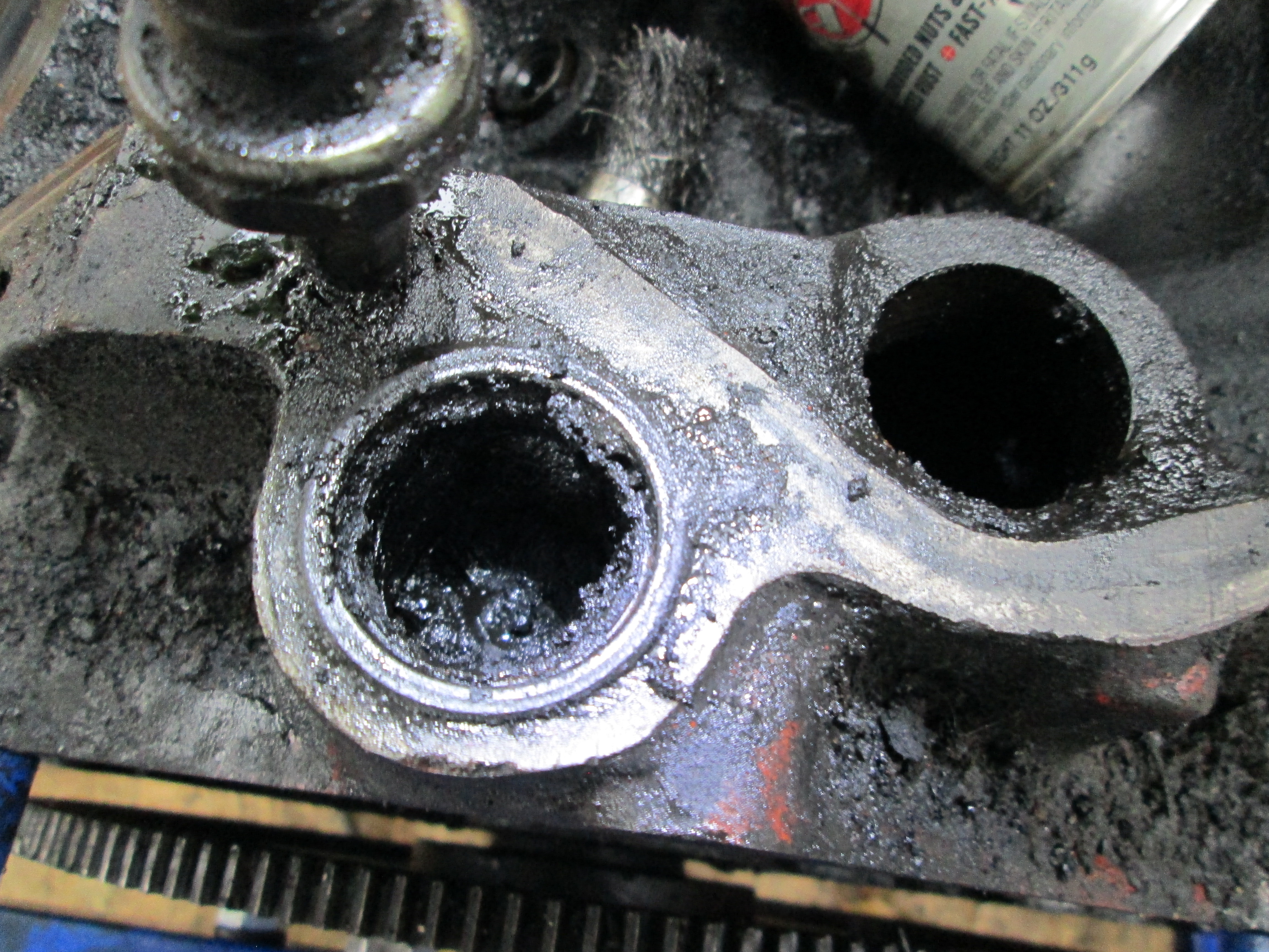 Oil gunk, hoping the power washer blasts it all off
